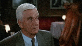 Leslie Nielsen in the naked gun gets slapped by third hand gif