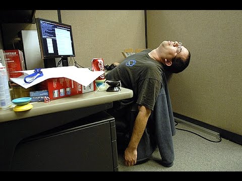 man asleep at chair in office