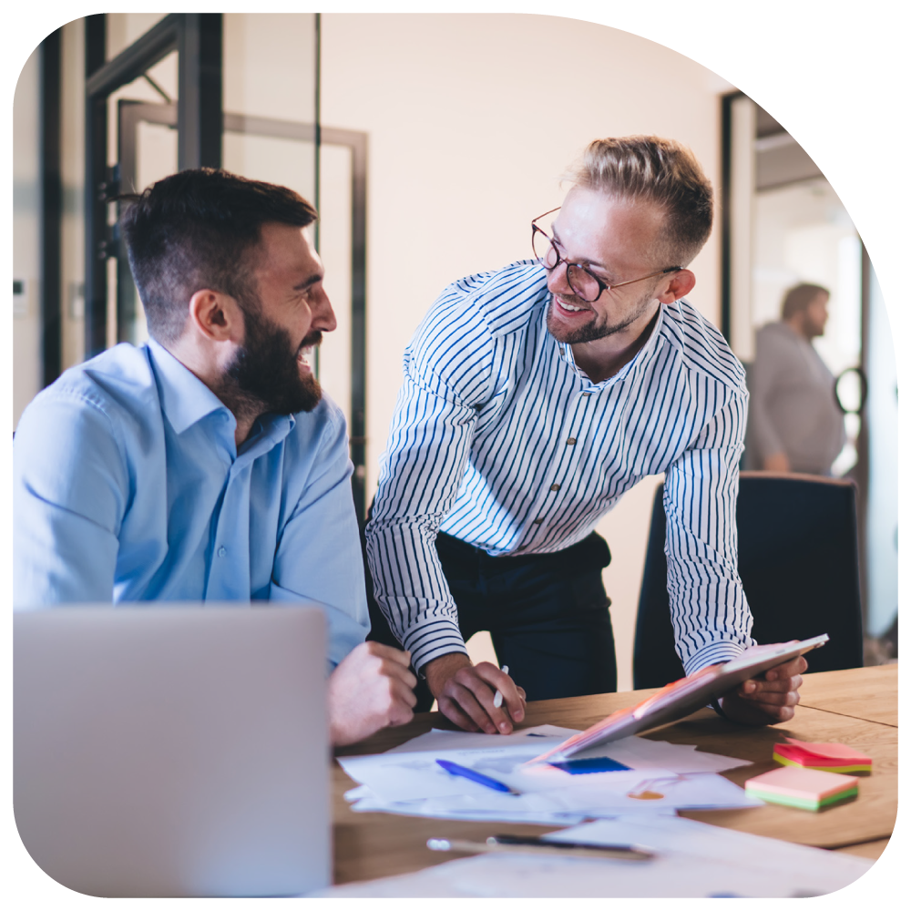 coworkers laughing in office